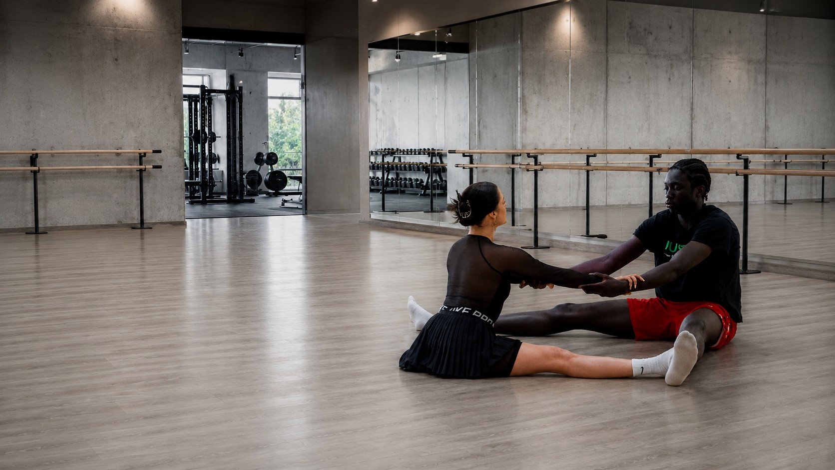 Srna leading a joint-isolation stretch session with an EYBL Vegas Elite athlete in the studio